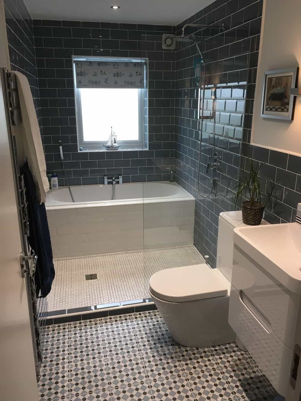 A Shower Area That Houses a Bathtub and a Shower Stall Both