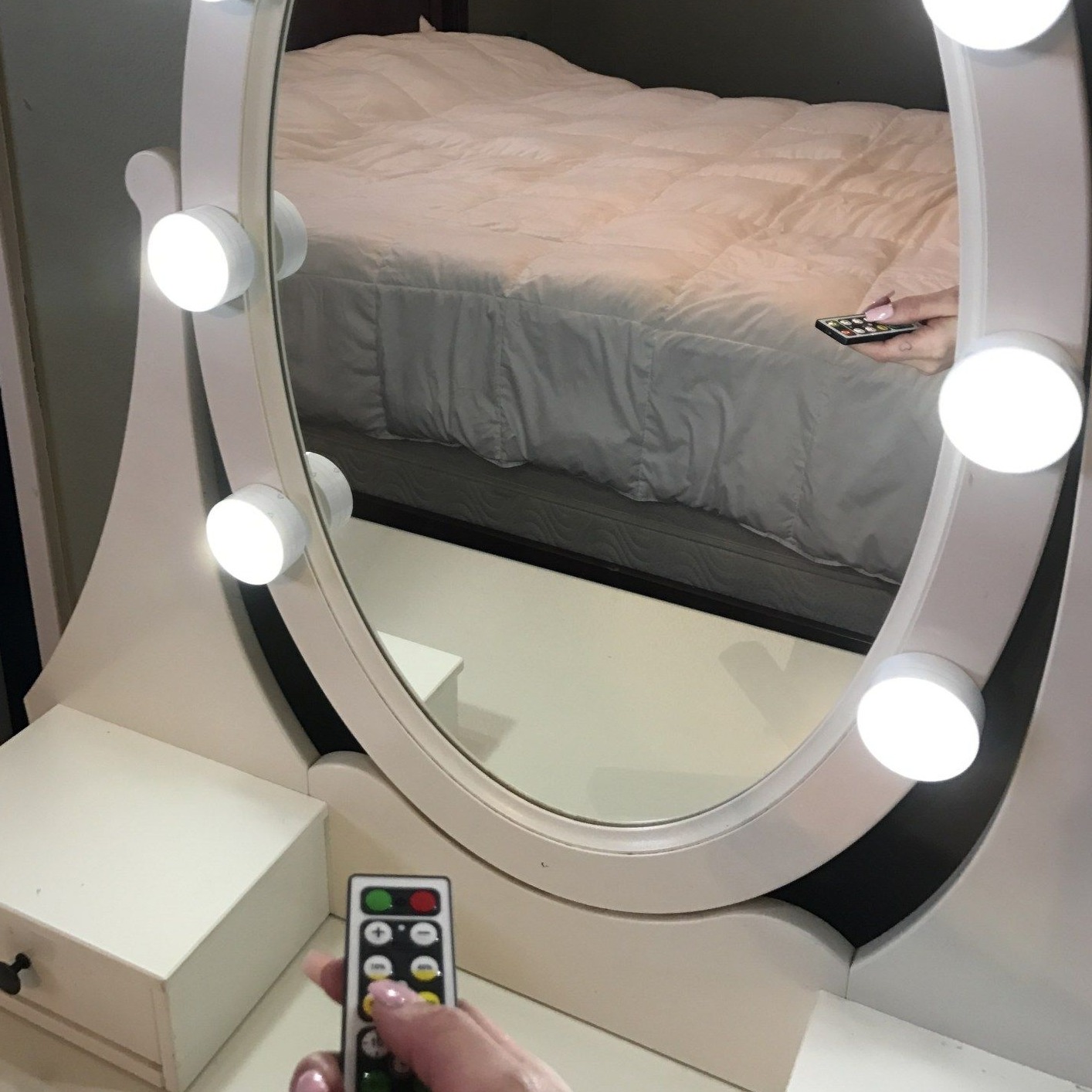 A Vanity Mirror with Remote Controlled