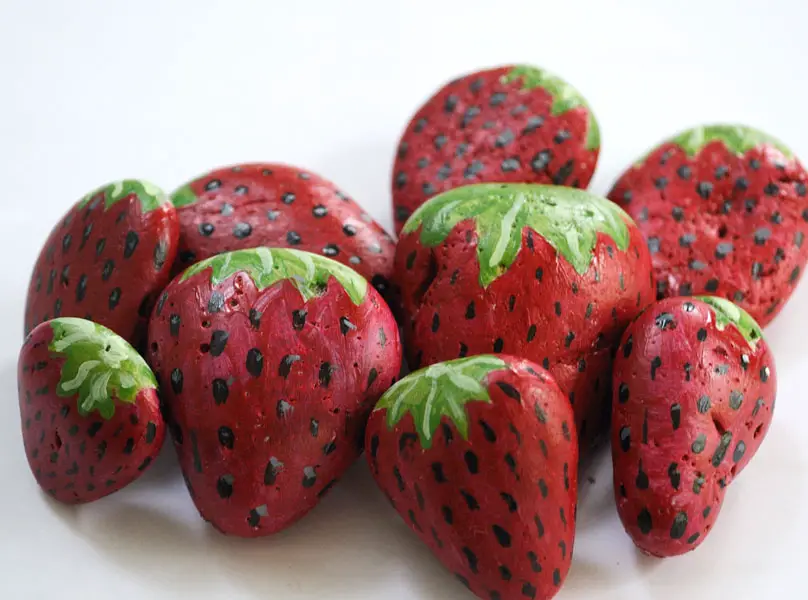 Paint rocks into Strawberries