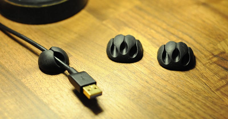 Rubber cable clips with indentations